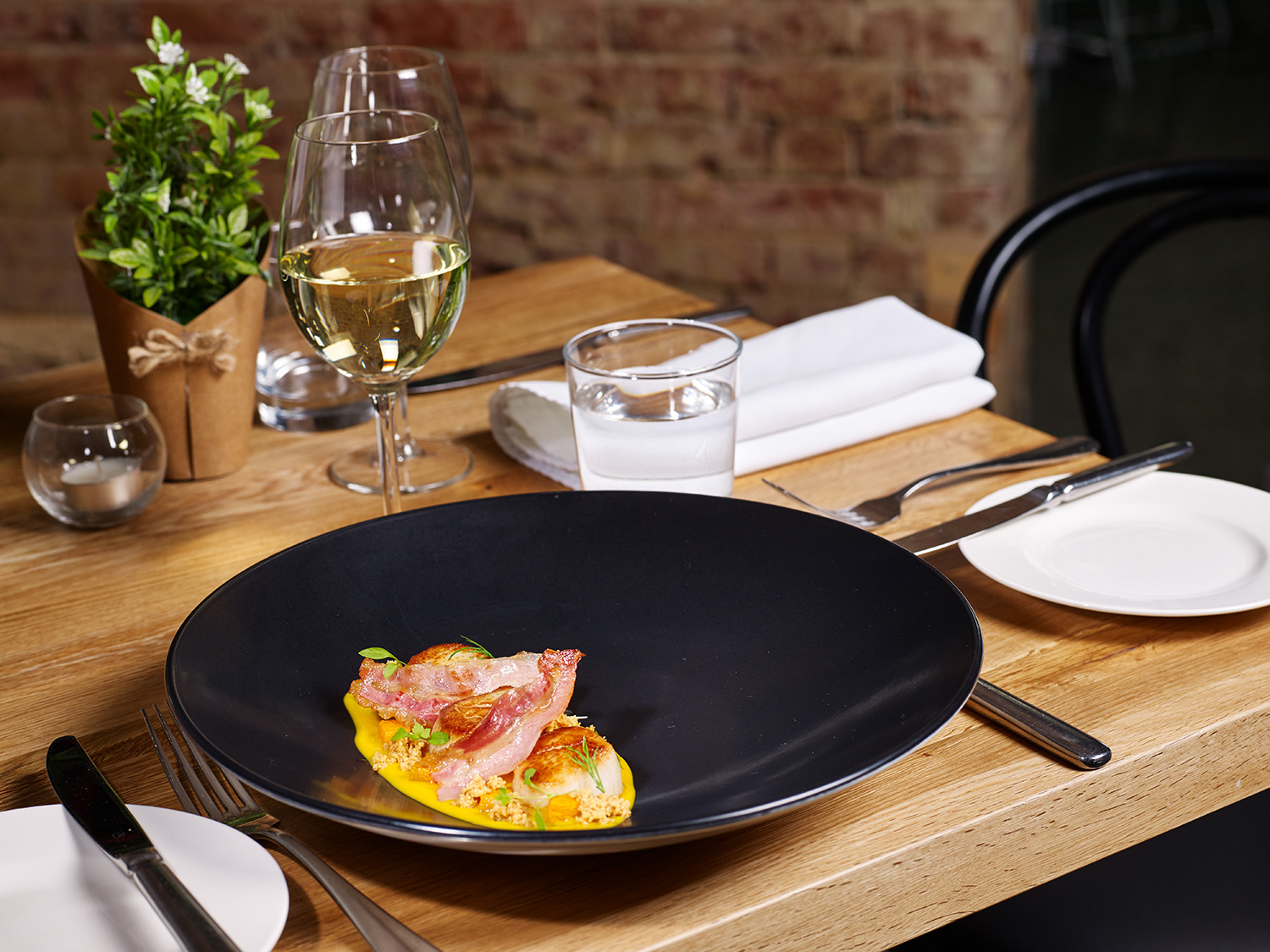 Seared scallops with butternut pumpkin, beurre noisette crumble and cured pig cheek.