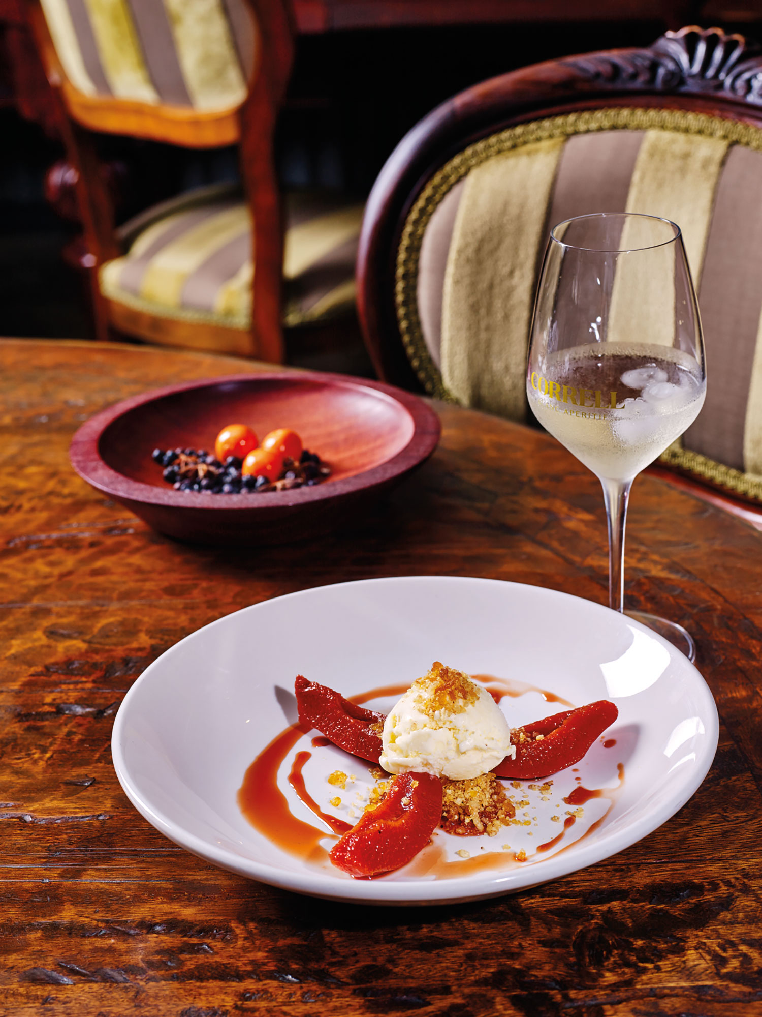 Poached quince with crunchy nut praline, served with Jones Winery Correll