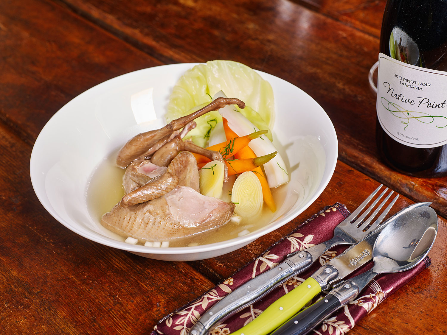 Quail, stock and vegetables