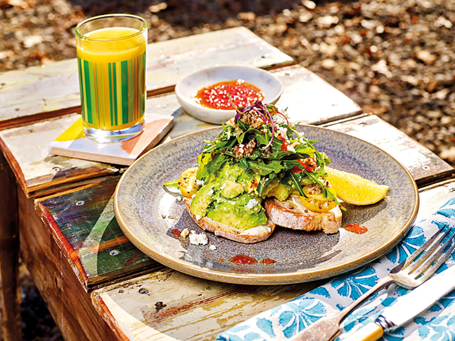 Smashed Avocado on Sourdough with mint and feta goat curd, chilli jam & quinoa