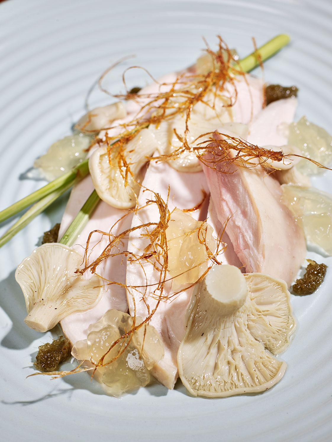 Poached chicken salad, fried lemongrass, pickled oyster mushroom, spring onion, green pepper salt