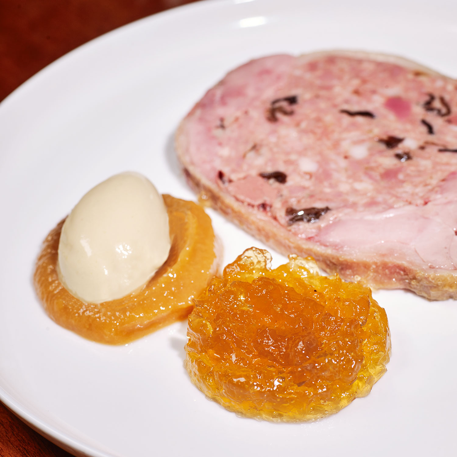 Dodine of duck served (warm), duck aspic, faux foie gras ice cream, spiced French toast, sweet and sour golden raisin purée