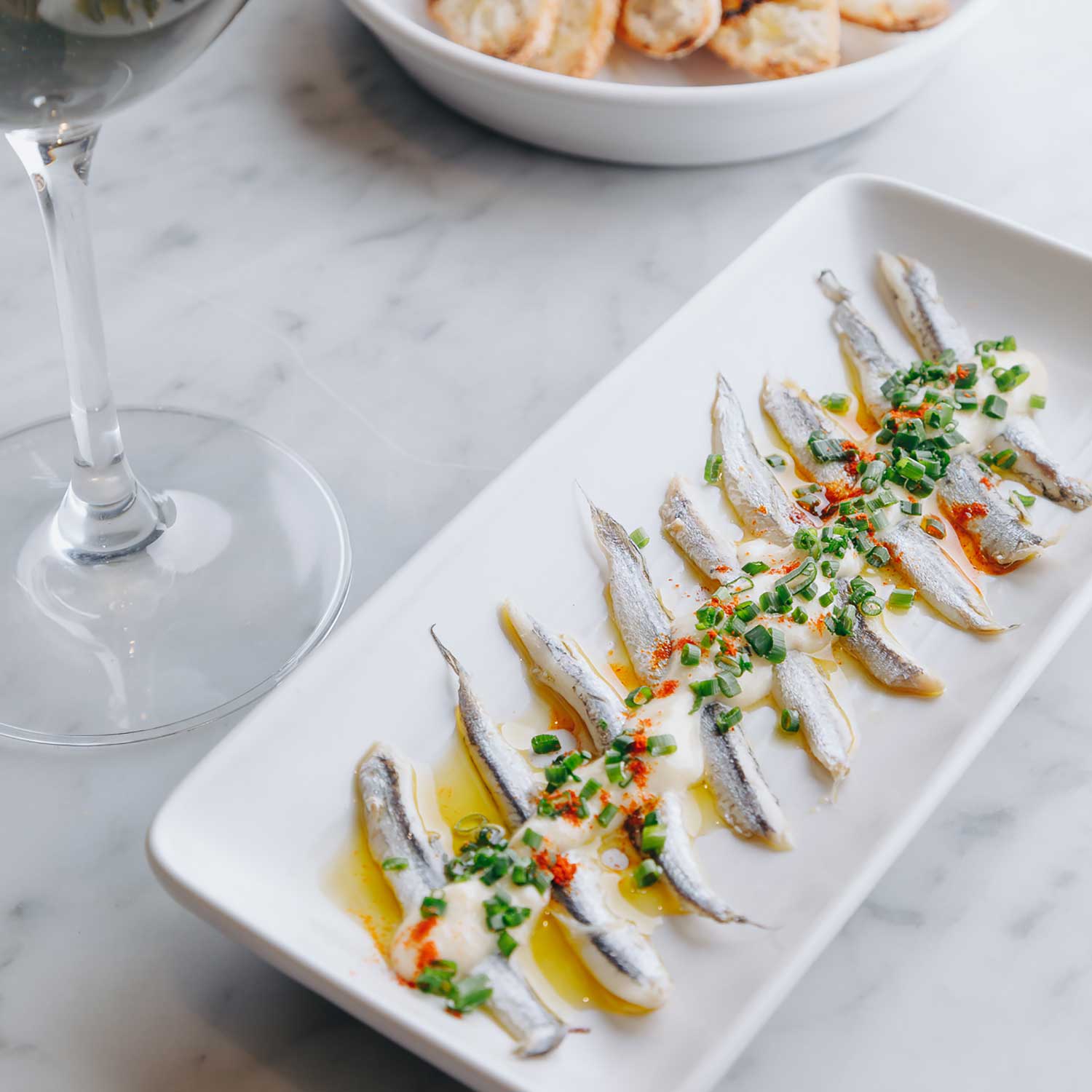 Boquerones: White anchovies, sweet paprika, salad cream, charred toast