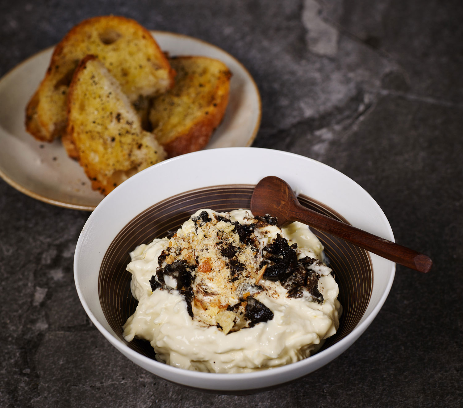 Stracciatella, black garlic, brioche crumb