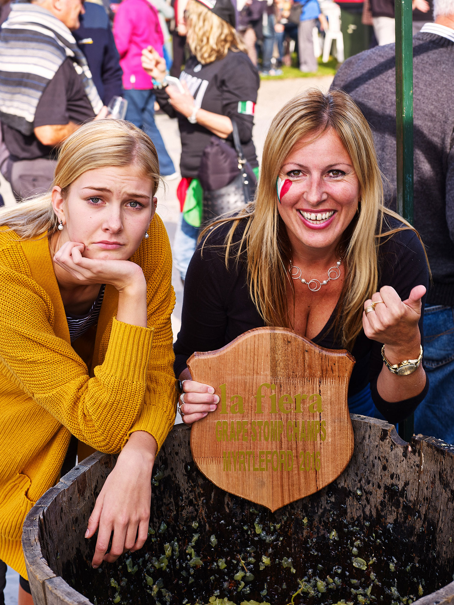 Winner, and loser of last year's Grape Stomping competition, at La Fiera Myrtleford