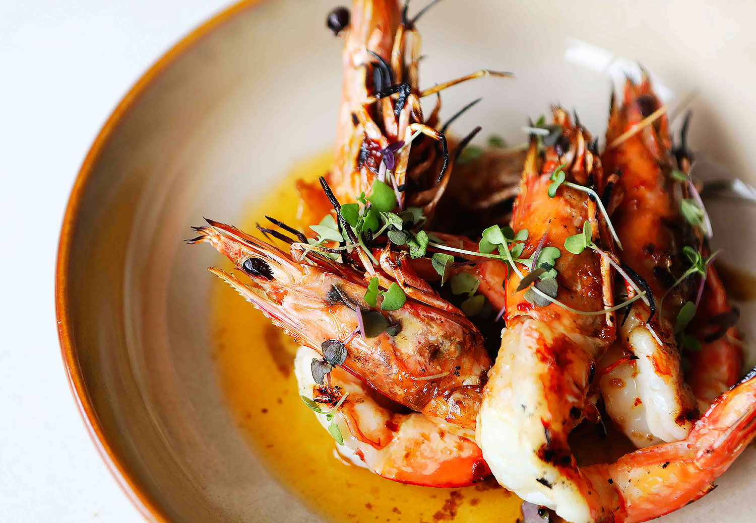 Wonderfully charred smokey flavours are a feature of the locally caught BBQ prawns
