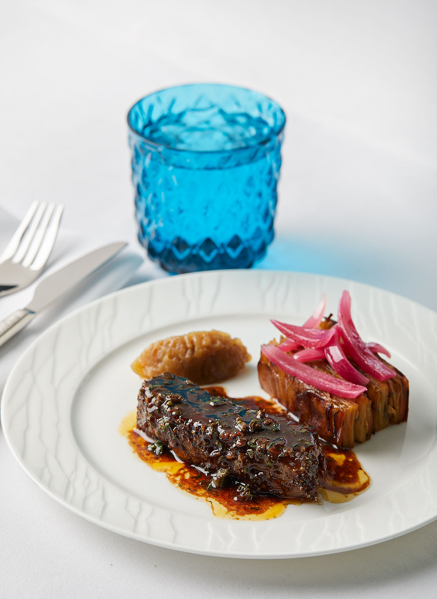 Bastourma beef short rib with onions and potato à la greque from George Calombaris's menu