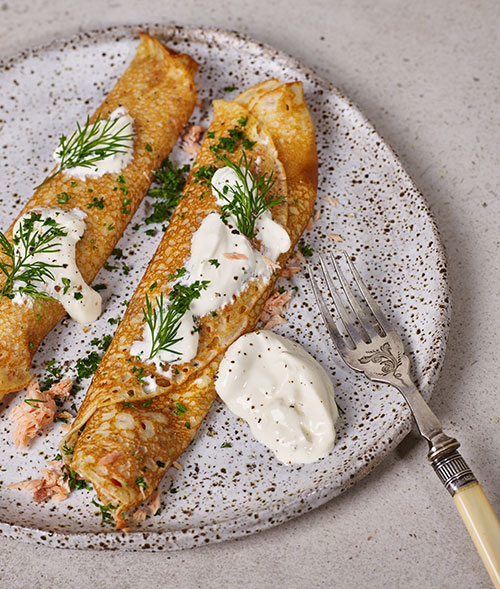 Kefir Crêpes with Smoked salmon, Pickled Onion, Sour Cream and Herbs