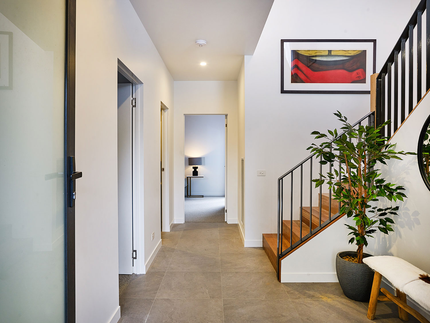 Art House Townhouses feature large formal entry areas